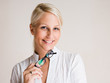 Photo: Friendly attractive blond business woman. Friendly attractive blond business woman.