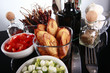 Staple latino sides, plantains, tomato, and chives