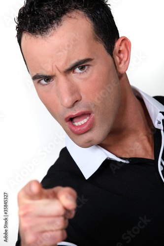 Photo: An angry man pointing his finger An angry man pointing his finger