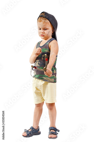 Photo: Little cute bully with a slingshot on a white background Little cute bully with a slingshot on a white background