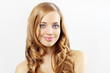 Beautiful girl with long wavy hair on gray background Beautiful girl with long wavy hair on gray background