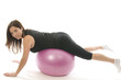 Photo: pretty woman exercising core training ball push-ups pretty woman exercising core training ball push-ups