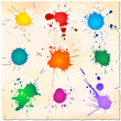 Set of colorful paint splats on old paper sheet