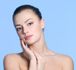 Beautiful face with healthy clean skin of young woman