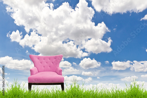 Photo: pink sofa on green grass and blue sky pink sofa on green grass and blue sky