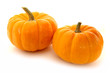 Two mini pumpkins on a white background Two mini pumpkins on a white background