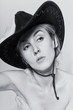 Naked women with cowboy hat