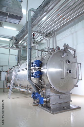 Photo: machinery in a pharmaceutical production plant machinery in a pharmaceutical production plant