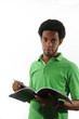 Photo: Young african man reading a magazine Young african man reading a magazine