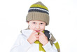 little boy wearing winter outfit isolated on white background