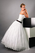 beautiful bride wearing black and white wedding dress in studio