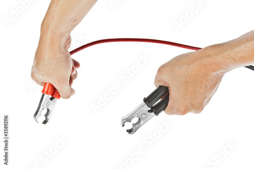 Photo: Human hand giving to charge battery Human hand giving to charge battery