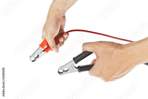 Photo: Human hand giving to charge battery Human hand giving to charge battery
