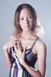 Young asian fashion woman posing in studio