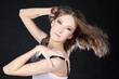 Young asian fashion woman with bright make-up posing in studio