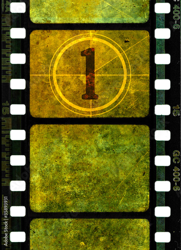 Illustration: Vintage 35mm movie film reel Vintage 35mm movie film reel