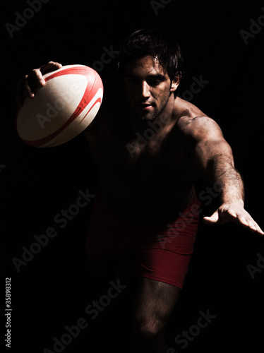 Photo: sexy topless rugby man scoring touchdown sexy topless rugby man scoring touchdown