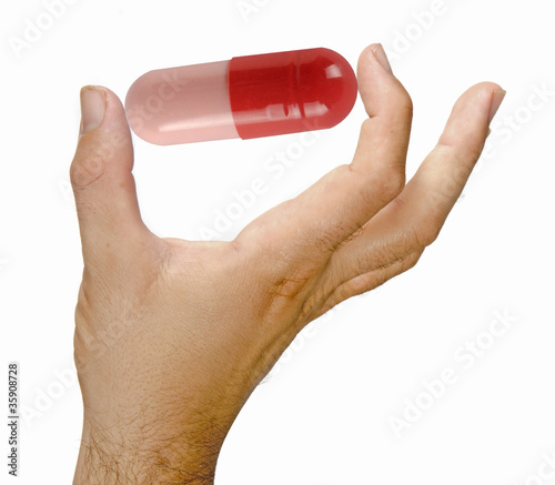 Photo: Pill in hand Pill in hand