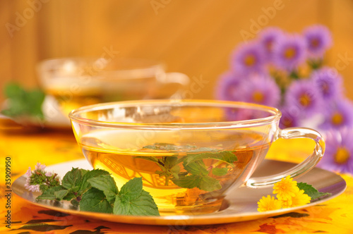 Photo: Teeglas mit Pfefferminztee und Deko Teeglas mit Pfefferminztee und Deko
