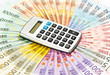 Photo : calculator on euro banknotes background