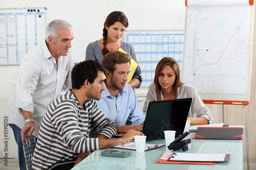 Photo: picture of a business meeting picture of a business meeting