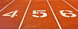 Number four five and six on the start of a running track Number four five and six on the start of a running track