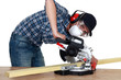 Man using a mitre saw