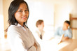 Standing Asian Businesswoman Arms Crossed