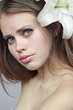 mysterious girl with a snow-white lily.