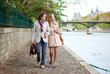 Romantic couple in Paris at the embankment