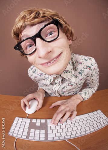 Photo: Funny guy at the computer Funny guy at the computer