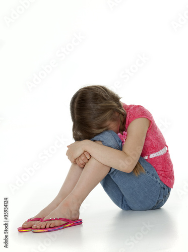 Photo: Upset Little Girl on White Upset Little Girl on White