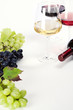 Glasses of white, red and rose wine and grapes