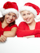 Pretty girls with santa hat has fun with copyspace