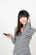 pretty asian woman listening music