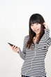 pretty asian woman listening music