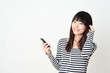 pretty asian woman listening music