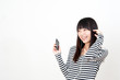pretty asian woman listening music