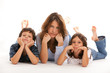 Sad mother, son and daughter on a white background