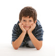 Cute thinking boy on a white background