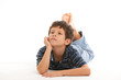 Cute thinking boy on a white background