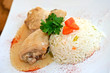Poulet-Oberschenkel an Weissweinsauce Poulet-Oberschenkel an Weissweinsauce