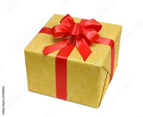 Foto: Goldene Geschenkpackung mit roter Schleife Goldene Geschenkpackung mit roter Schleife