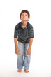 Cute boy with bored expresion on a white background