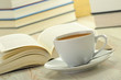 Books and cup of coffee on the table Books and cup of coffee on the table