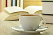 Books and cup of coffee on the table Books and cup of coffee on the table