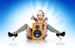 Glamorous sexy party girl in headphones with speaker Glamorous sexy party girl in headphones with speaker