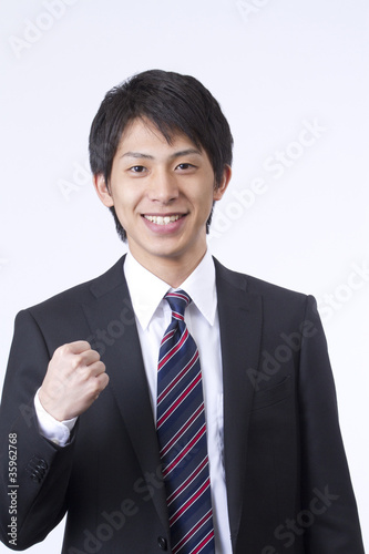 Foto: ガッツポーズの新人ビジネスマン ガッツポーズの新人ビジネスマン
