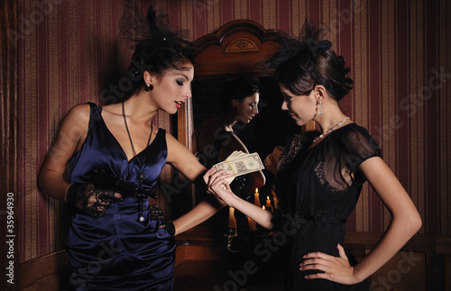 Photo: Gangsters girls divide the money Gangsters girls divide the money