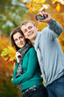 Couple at autumn outdoors